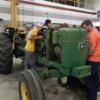 Ag. students working on a tractor. 