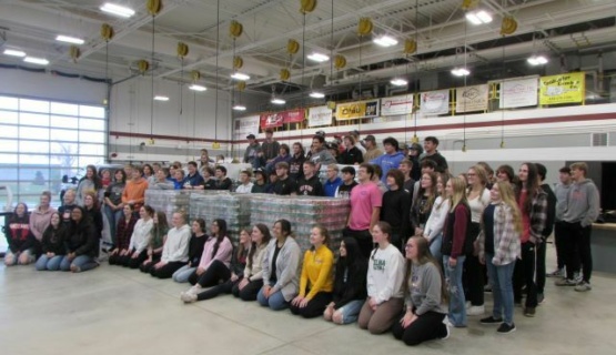 Tri Star seniors pose with the over 19,000 cans they collected to donate to local food pantries in Mercer and Auglaize Counties. 