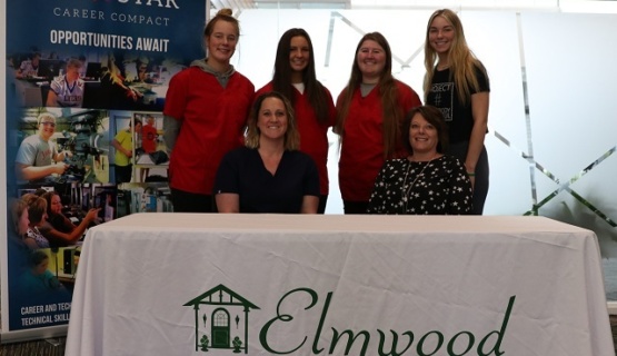Elmwood representatives with Tri Star students on signing day. 