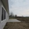 Rear exterior.  You can see Wright State Lake Campus and Grand Lake from the patio.: Gallery Image 2 
