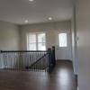 Entry and large open great room.  Basement stairs just inside front entry.: Gallery Image 1 