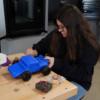 Alaina Young works on her radio controlled car for her capstone project.: Gallery Image 1 