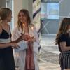 A junior shares a moment with a senior after candle she lights her candle.: Gallery Image 1 
