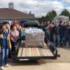 Seniors deliver and unload the canned foods the Tri Star students donated to CALL Ministries Food Pantry in Celina.: Gallery Image 1 