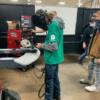 Tri Star welding student trying the virtual welder at Crown Equipment. 