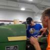 Ag. Industrial Tech. students work to repair a tractor. 