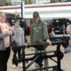 Eighth grade students try their hand at auto work. 