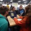 Graphic seniors helping sophomores design their sketch pad cover.: Gallery Image 1 