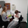 Med Prep seniors demonstrate some of the skills they learn with sophomores as patients in Med Prep.: Gallery Image 1 
