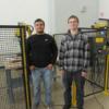 High school students enrolled in a Tri Star program during the school day took the evening adult robotics class and earned FANUC certification. 