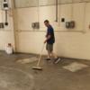 Administrator Brian Stetler sweeping up at the Dennings Building.: Gallery Image 1 