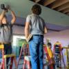 Junior Construction students hanging drywall in the animal barn.: Gallery Image 3 