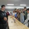 8th graders look over the pieces that have been 3D printed in the Engineering classroom.: Gallery Image 1 