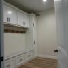 Entrance from garage leads to large mudroom.: Gallery Image 1 