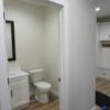 Half-bath around the corner from the mudroom and garage entrance.: Gallery Image 1 