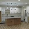 Kitchen island, cabinetry, granite counters, range wall, sink, etc.: Gallery Image 3 