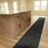Kitchen island, cabinetry, granite counters, range wall, sink, etc.: Gallery Image 1 