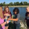 Animal Health students at the Tri Star pond figuring out what is in the vial. 