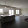 Great room view from foyer and kitchen.: Gallery Image 2 