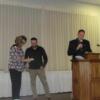 Tim Buschur and Aaron Schmidt present Karen Perts an Outstanding Ed. Partnership award.: Gallery Image 1 