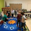 Teaching Professions student(s) working with elementary students on a STEM activity.: Gallery Image 1 