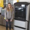 Taylor Hesse with her new 3D printer.: Gallery Image 1 