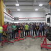 The Junior Ag. Industrial Tech. class and instructor Ken Platfoot (far right) pose behind the engine stands paid for by the Floyd Winner Family. Thank you!: Gallery Image 1 