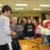 Demonstrating the use of robotics to 8th graders. 