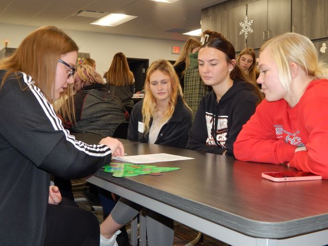 Sophomores listen to an Early Childhood/Teacher Ed. student discuss writing lesson plans.: Featured Image 1 