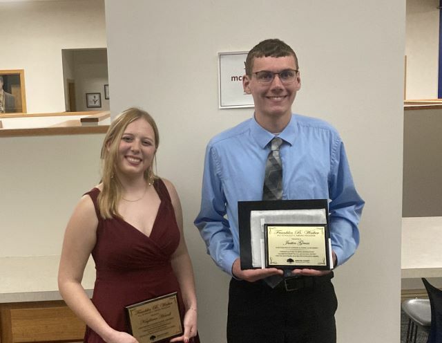 Two students (Kayliann Howell (on left) and Justin Gruss stand holding their Franklin B. Walter Scholarship certificates.: Featured Image 1 