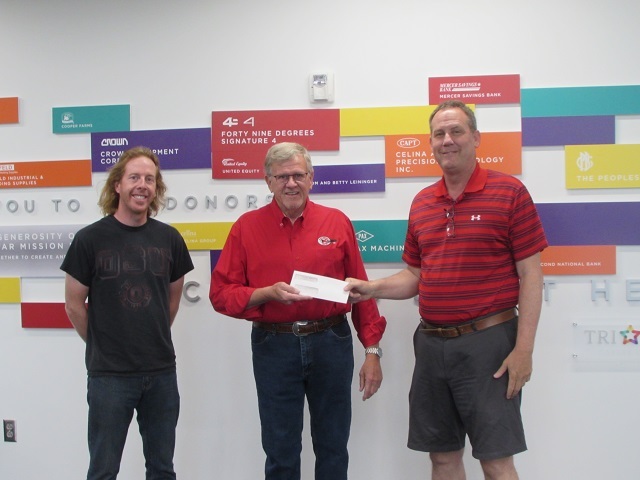 Pictured are Mike Seibert, Jeff McFall and Tim Buschur with the donation check.: Featured Image 1 