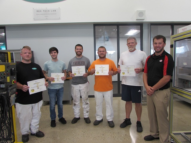 Five adult students with their certificates and their instructor at the completion of the 30 hour Fanuc Robotics class.: Featured Image 1 