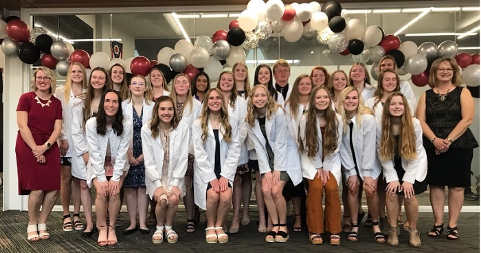 Senior Med Prep students and their instructors after the pinning ceremony.: Featured Image 1 